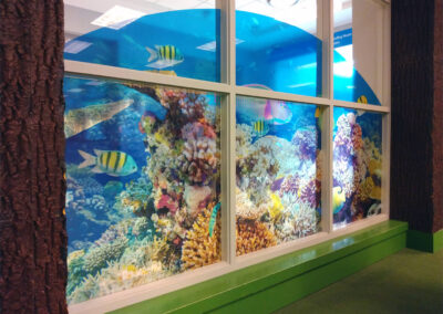 A vinyl window decal of an aquarium with tropical fish